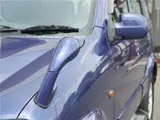 2004 Toyota Cami 1300Q / Side steps / Rear spoiler / Aluminum wheels / Spare spare tire / 4WD Blue Sedan for sale, Japanese used car export - photo 29 of 50 | GULJI TRADERS