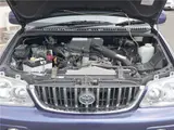 2004 Toyota Cami 1300Q / Side steps / Rear spoiler / Aluminum wheels / Spare spare tire / 4WD Blue Sedan for sale, Japanese used car export - photo 36 of 50 | GULJI TRADERS