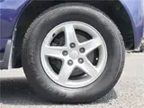 2004 Toyota Cami 1300Q / Side steps / Rear spoiler / Aluminum wheels / Spare spare tire / 4WD Blue Sedan for sale, Japanese used car export - photo 37 of 50 | GULJI TRADERS