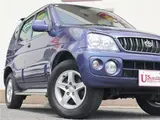 2004 Toyota Cami 1300Q / Side steps / Rear spoiler / Aluminum wheels / Spare spare tire / 4WD Blue Sedan for sale, Japanese used car export - photo 41 of 50 | GULJI TRADERS