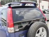 2004 Toyota Cami 1300Q / Side steps / Rear spoiler / Aluminum wheels / Spare spare tire / 4WD Blue Sedan for sale, Japanese used car export - photo 47 of 50 | GULJI TRADERS