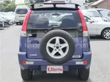 2004 Toyota Cami 1300Q / Side steps / Rear spoiler / Aluminum wheels / Spare spare tire / 4WD Blue Sedan for sale, Japanese used car export - photo 48 of 50 | GULJI TRADERS