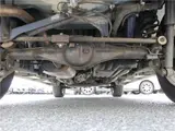 2004 Toyota Cami 1300Q / Side steps / Rear spoiler / Aluminum wheels / Spare spare tire / 4WD Blue Sedan for sale, Japanese used car export - photo 49 of 50 | GULJI TRADERS