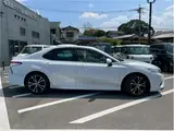 2019 Toyota Camry WS Leather Package: Genuine navigation system, backup camera, ETC, heated seats. White Sedan for sale, Japanese used car export - photo 2 of 60 | GULJI TRADERS