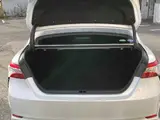 2020 Toyota Camry WS White Sedan for sale, Japanese used car export - photo 48 of 50 | GULJI TRADERS