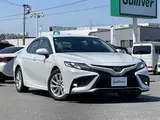 2021 Toyota Camry WS 4WD White Sedan for sale, Japanese used car export - photo 1 of 24 | GULJI TRADERS