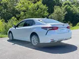 2021 Toyota Camry WS 4WD White Sedan for sale, Japanese used car export - photo 2 of 24 | GULJI TRADERS
