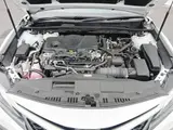 2021 Toyota Camry 2.5WS White Sedan for sale, Japanese used car export - photo 20 of 30 | GULJI TRADERS