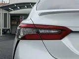 2021 Toyota Camry 2.5WS White Sedan for sale, Japanese used car export - photo 28 of 30 | GULJI TRADERS