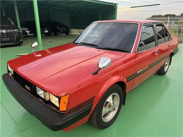 1983 Toyota Carina 1800GT-TR - photo 1 1983 Toyota Carina 1800GT-TR Red Sedan for sale, Japanese used car export - photo 1 of 41 | GULJI TRADERS