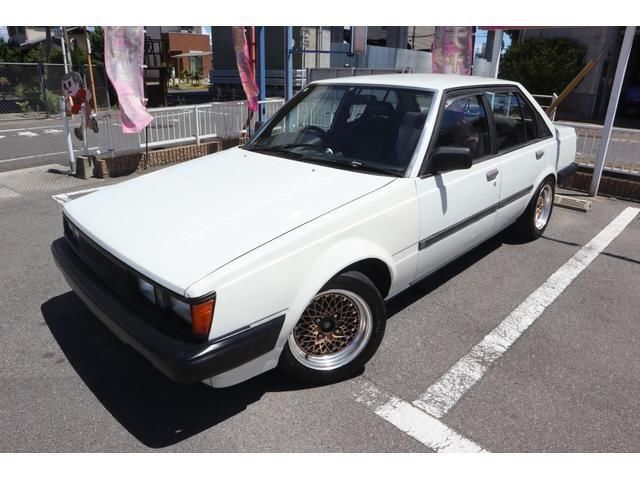 1985 Toyota Carina GT-R White Sedan for sale, Japanese used car export | GULJI TRADING