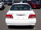 2001 Toyota Carina Si White Sedan for sale, Japanese used car export - photo 2 of 9 | GULJI TRADERS