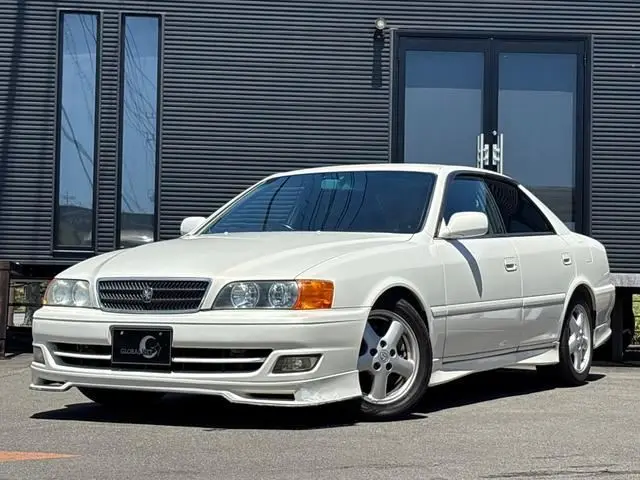 2000 Toyota Chaser ★Late Model★Tourer V★Turbo★1JZ-GTE★Genuine Full Aero Kit★ - photo 1 2000 Toyota Chaser ★Late Model★Tourer V★Turbo★1JZ-GTE★Genuine Full Aero Kit★ Pearl Sedan for sale, Japanese used car export - photo 1 of 32 | GULJI TRADERS