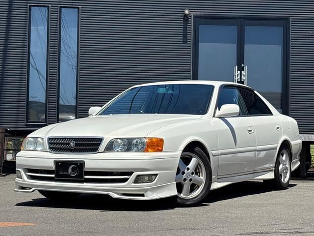 2000 Toyota Chaser ★Late Model★Tourer V★Turbo★1JZ-GTE★Genuine Full Aero Kit★ - photo 1 2000 Toyota Chaser ★Late Model★Tourer V★Turbo★1JZ-GTE★Genuine Full Aero Kit★ Pearl Sedan for sale, Japanese used car export | GULJI TRADERS