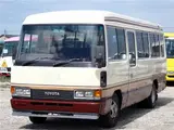 1988 Toyota Coaster Long EX Turbo 29-seater White Van for sale, Japanese used car export - photo 1 of 80 | GULJI TRADERS