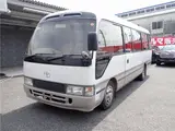 1993 Toyota Coaster Long GX Turbo 28-seater White Van for sale, Japanese used car export - photo 1 of 80 | GULJI TRADERS