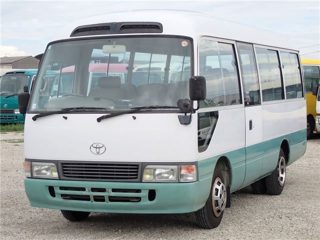 1994 Toyota Coaster LX_26-seater - photo 1 1994 Toyota Coaster LX_26-seater White Van for sale, Japanese used car export | GULJI TRADERS