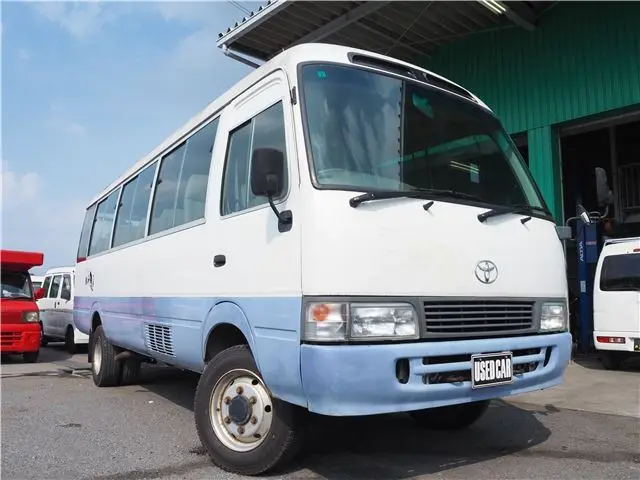 1997 Toyota Coaster LX - photo 1 1997 Toyota Coaster LX White Van for sale, Japanese used car export - photo 1 of 35 | GULJI TRADERS