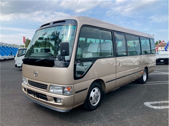 2005 Toyota Coaster Long - photo 1 2005 Toyota Coaster Long Sedan for sale, Japanese used car export - photo 1 of 66 | GULJI TRADERS