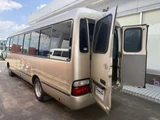 2009 Toyota Coaster Turbo Sedan for sale, Japanese used car export - photo 1 of 34 | GULJI TRADERS