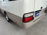 2009 Toyota Coaster Turbo Sedan for sale, Japanese used car export - photo 34 of 41 | GULJI TRADERS