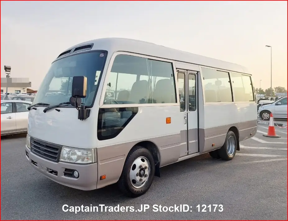 2010 Toyota Coaster - photo 1 2010 Toyota Coaster Pearl white Van for sale, Japanese used car export | GULJI TRADERS