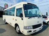2014 Toyota Coaster Long LX 29-seater White Van for sale, Japanese used car export - photo 1 of 35 | GULJI TRADERS