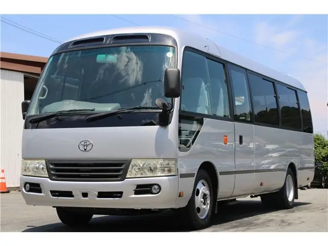 2014 Toyota Coaster Microbus GX Turbo Long, 29-seater Silver Van for sale, Japanese used car export - photo 1 of 61 | GULJI TRADERS