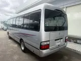 2014 Toyota Coaster 29-seater GX Long with automatic doors, reclining seats, non-smoking vehicle. Silver Van for sale, Japanese used car export - photo 5 of 35 | GULJI TRADERS