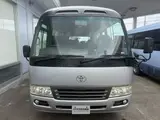 2014 Toyota Coaster 29-seater GX Long with automatic doors, reclining seats, non-smoking vehicle. Silver Van for sale, Japanese used car export - photo 6 of 35 | GULJI TRADERS