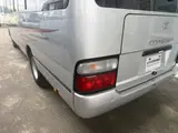 2014 Toyota Coaster 29-seater GX Long with automatic doors, reclining seats, non-smoking vehicle. Silver Van for sale, Japanese used car export - photo 10 of 35 | GULJI TRADERS
