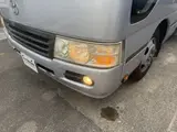 2014 Toyota Coaster 29-seater GX Long with automatic doors, reclining seats, non-smoking vehicle. Silver Van for sale, Japanese used car export - photo 24 of 35 | GULJI TRADERS