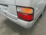 2014 Toyota Coaster 29-seater GX Long with automatic doors, reclining seats, non-smoking vehicle. Silver Van for sale, Japanese used car export - photo 28 of 35 | GULJI TRADERS