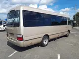 2014 Toyota Coaster Long EX Turbo Gold Van for sale, Japanese used car export - photo 2 of 10 | GULJI TRADERS