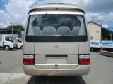 2014 Toyota Coaster 29-seater minibus, sightseeing specifications. Gold Van for sale, Japanese used car export - photo 3 of 9 | GULJI TRADERS