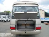 2014 Toyota Coaster 29-seater minibus, sightseeing specifications. Gold Van for sale, Japanese used car export - photo 4 of 9 | GULJI TRADERS