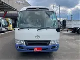 2015 Toyota Coaster Big Bang Long 9-seater with automatic doors White Van for sale, Japanese used car export - photo 4 of 47 | GULJI TRADERS