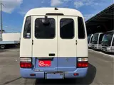 2015 Toyota Coaster Big Bang Long 9-seater with automatic doors White Van for sale, Japanese used car export - photo 5 of 47 | GULJI TRADERS