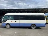 2015 Toyota Coaster Big Bang Long 9-seater with automatic doors White Van for sale, Japanese used car export - photo 6 of 47 | GULJI TRADERS