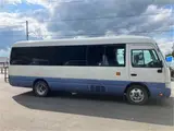 2015 Toyota Coaster Big Bang Long 9-seater with automatic doors White Van for sale, Japanese used car export - photo 7 of 47 | GULJI TRADERS