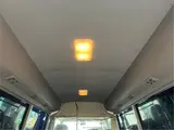 2015 Toyota Coaster Big Bang Long 9-seater with automatic doors White Van for sale, Japanese used car export - photo 14 of 47 | GULJI TRADERS
