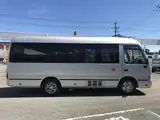 2015 Toyota Coaster Gifu Prefecture, 26-seater, minibus, electric side steps, 5-speed manual transmission. Silver Van for sale, Japanese used car export - photo 8 of 63 | GULJI TRADERS