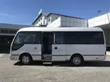 2015 Toyota Coaster Gifu Prefecture, 26-seater, minibus, electric side steps, 5-speed manual transmission. Silver Van for sale, Japanese used car export - photo 9 of 63 | GULJI TRADERS
