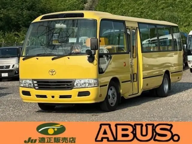 2015 Toyota Coaster Turbo car for toddlers Yellow Van for sale, Japanese used car export - photo 1 of 9 | GULJI TRADERS