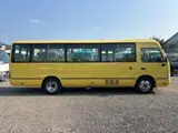 2015 Toyota Coaster Turbo car for toddlers Yellow Van for sale, Japanese used car export - photo 8 of 9 | GULJI TRADERS