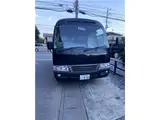 2016 Toyota Coaster Big Bang 9-seater, Class 1 license plate, double doors Black Color changed Van for sale, Japanese used car export - photo 1 of 16 | GULJI TRADERS