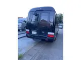 2016 Toyota Coaster Big Bang 9-seater, Class 1 license plate, double doors Black Color changed Van for sale, Japanese used car export - photo 2 of 16 | GULJI TRADERS