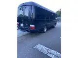 2016 Toyota Coaster Big Bang 9-seater, Class 1 license plate, double doors Black Color changed Van for sale, Japanese used car export - photo 12 of 16 | GULJI TRADERS