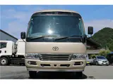 2016 Toyota Coaster Microbus EX Turbo Long, 29-seater Gold Van for sale, Japanese used car export - photo 2 of 62 | GULJI TRADERS