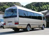 2016 Toyota Coaster Microbus EX Turbo Long, 29-seater Gold Van for sale, Japanese used car export - photo 7 of 62 | GULJI TRADERS